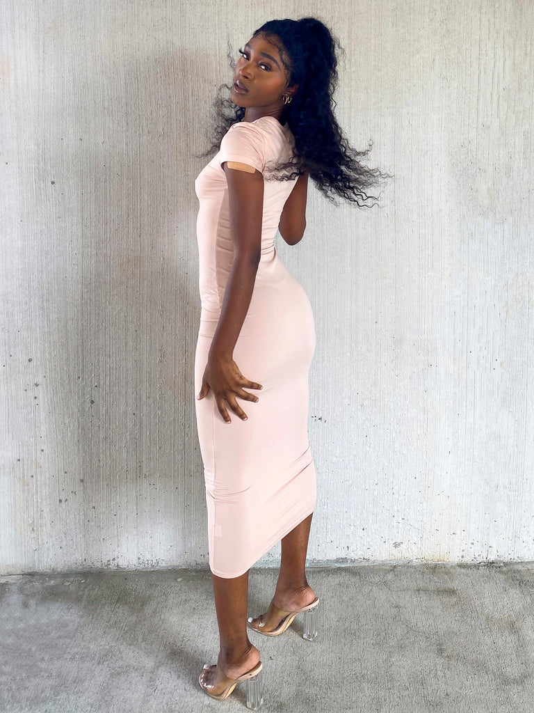 Black woman modeling basic midi bodycon dress