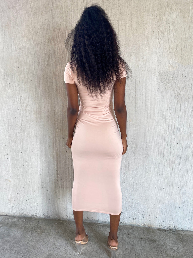 Black woman modeling basic midi bodycon dress